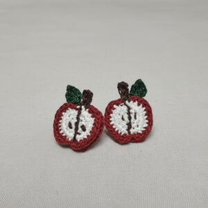 4. apple-shaped crochet earrings on soft background