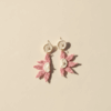 Lotus Bloom Crochet Earrings handcrafted in pink and ivory yarn